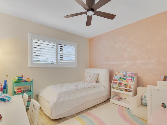 bedroom featuring ceiling fan