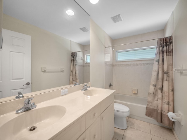 full bathroom featuring toilet, shower / bath combination with curtain, vanity, and tile patterned flooring