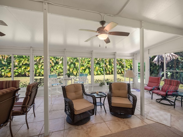 sunroom with ceiling fan