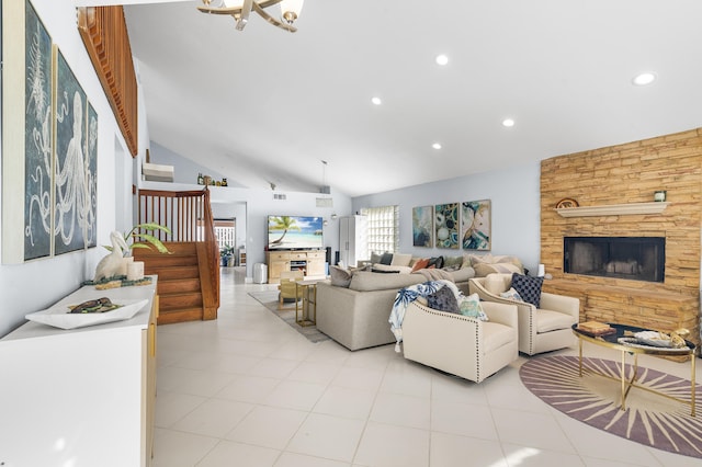 tiled living room with lofted ceiling, a fireplace, and a notable chandelier