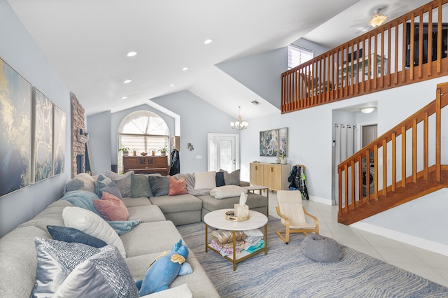 tiled living room featuring vaulted ceiling and a chandelier