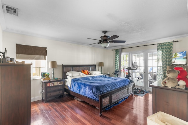 bedroom featuring ceiling fan, access to exterior, dark wood-type flooring, ornamental molding, and a textured ceiling