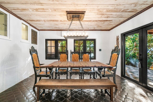 dining room featuring french doors, wood ceiling, ornamental molding, and stone tile floors