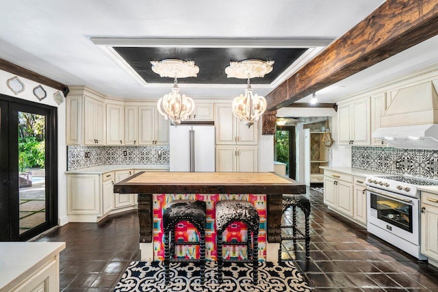 kitchen with white appliances, custom exhaust hood, butcher block counters, decorative backsplash, and a chandelier