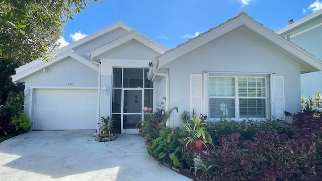 view of front of property featuring a garage