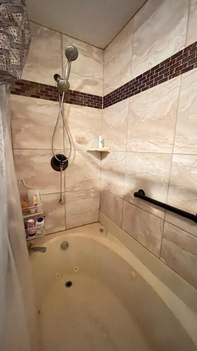 bathroom featuring shower / tub combo with curtain