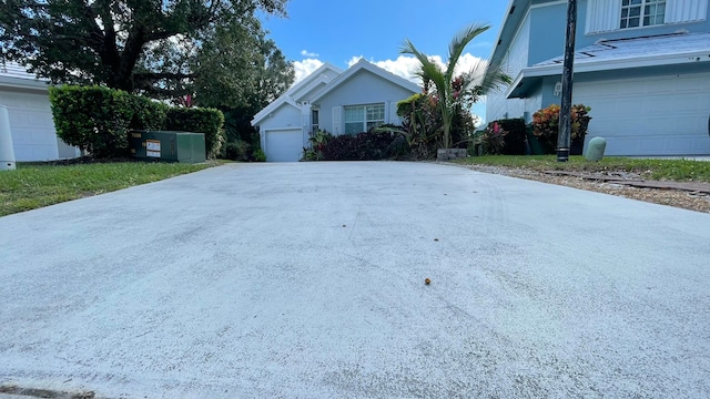 view of property exterior featuring a garage