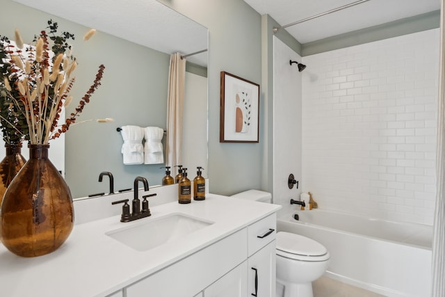 full bathroom with vanity, toilet, and tiled shower / bath combo