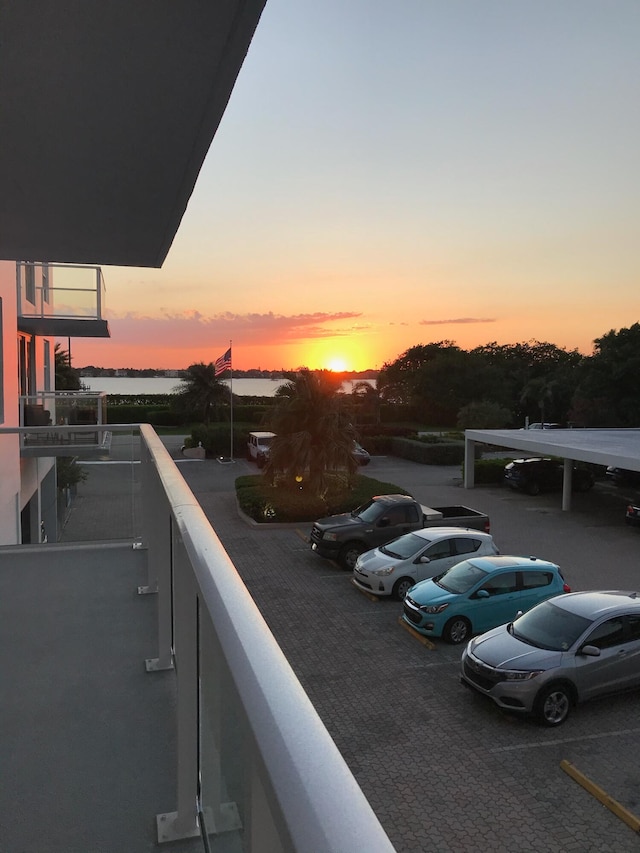 view of balcony at dusk