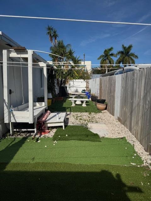 view of yard featuring a fenced backyard