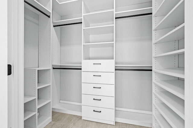 walk in closet featuring light wood-type flooring