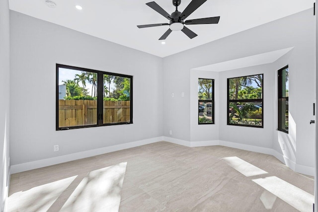 empty room featuring ceiling fan