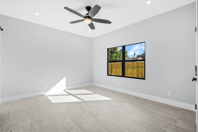 spare room featuring ceiling fan