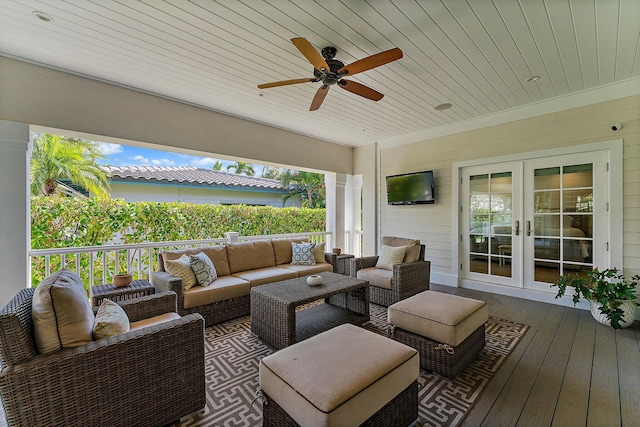 wooden deck featuring french doors and an outdoor hangout area