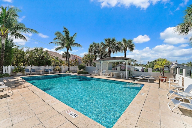 view of swimming pool featuring a patio area