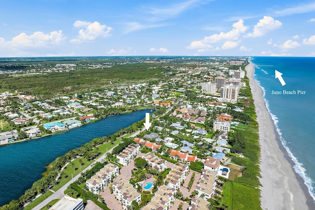 aerial view featuring a view of the beach and a water view