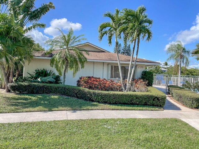 view of front of home with a front yard