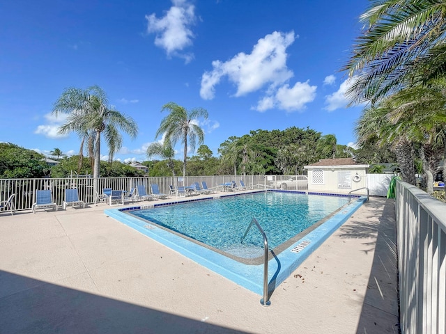 view of pool featuring a patio