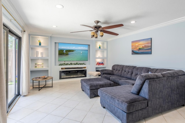 living room with crown molding, ceiling fan, light tile patterned floors, and built in shelves