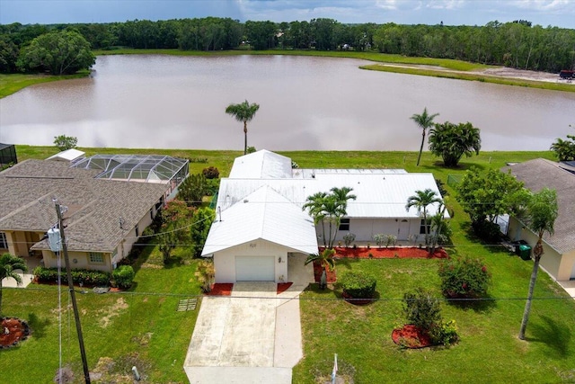 drone / aerial view with a water view