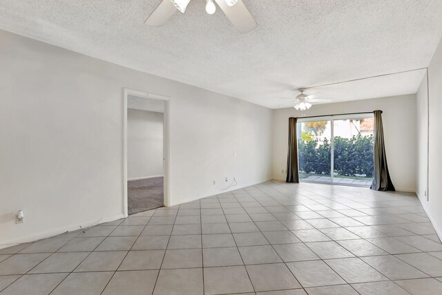 kitchen featuring white appliances, light tile patterned floors, visible vents, light countertops, and a sink