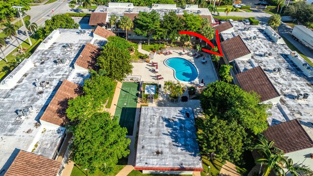 view of property exterior featuring a patio and a lawn