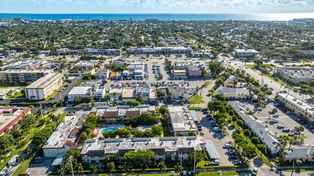 drone / aerial view featuring a city view