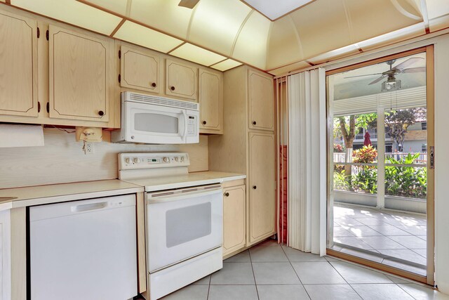 tiled spare room featuring a textured ceiling and ceiling fan