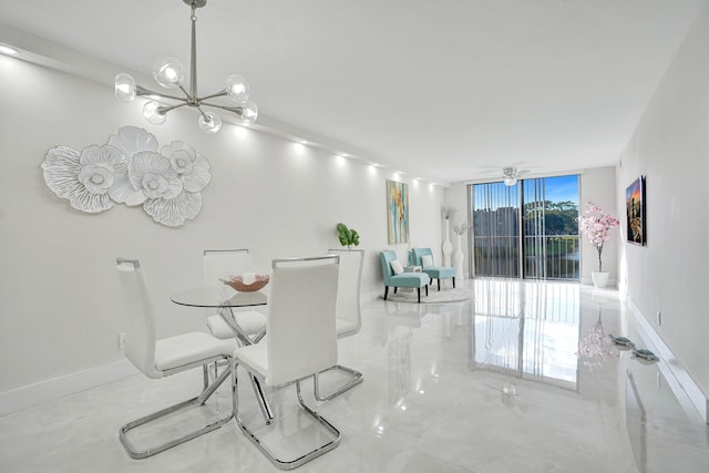 dining room with a wall of windows and a chandelier