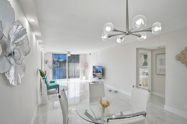 dining room with plenty of natural light and a chandelier