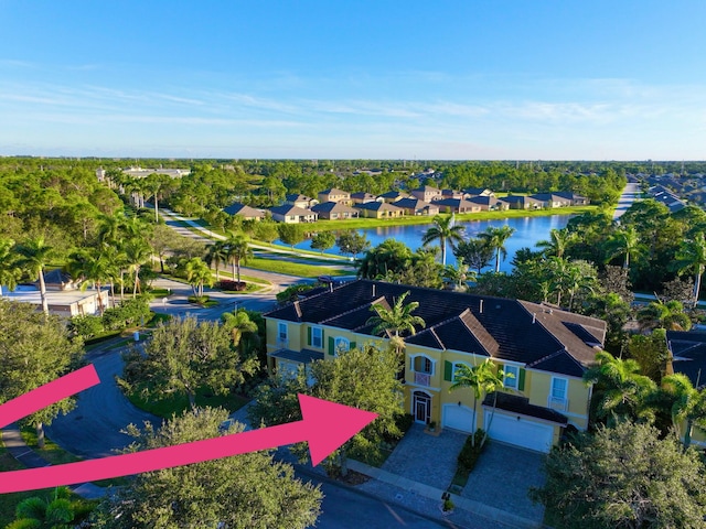 bird's eye view with a water view