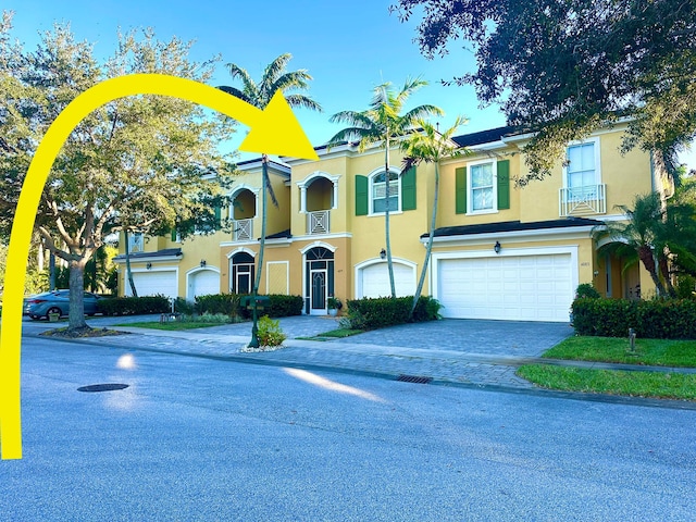 view of front of property featuring a garage