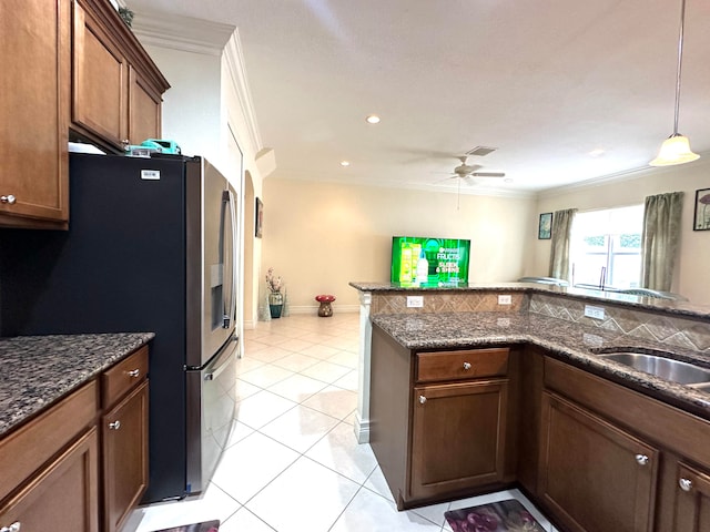 kitchen featuring ceiling fan, light tile patterned flooring, stainless steel fridge with ice dispenser, and crown molding