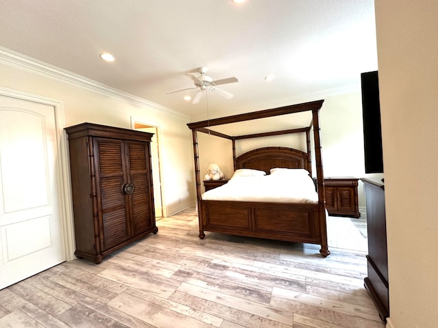 bedroom with ceiling fan, light hardwood / wood-style floors, and ornamental molding