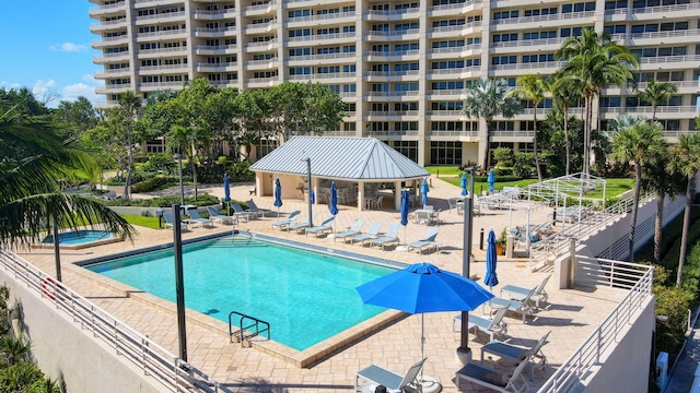 view of pool featuring a gazebo and a patio area