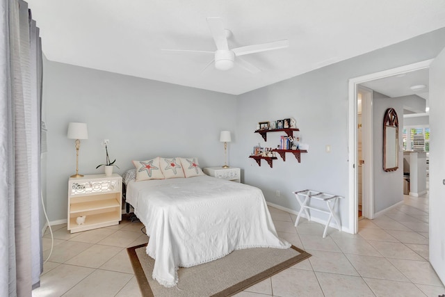 bedroom with ceiling fan and light tile patterned flooring