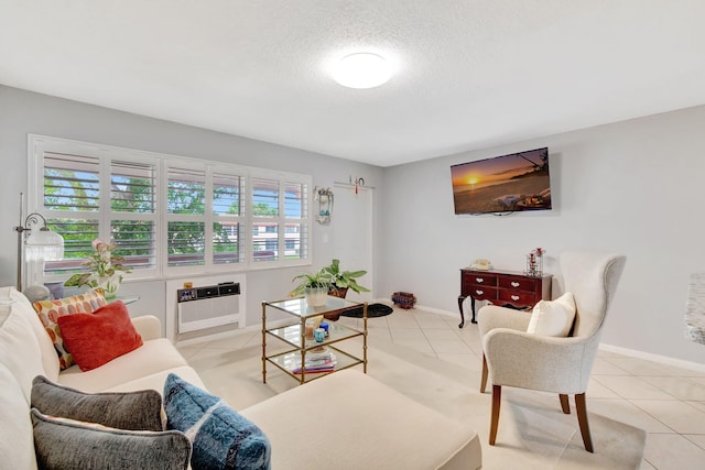 tiled living room featuring a healthy amount of sunlight, a textured ceiling, and heating unit