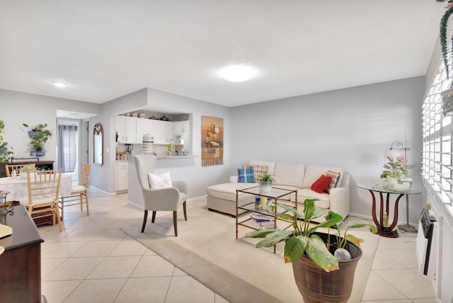 living room with light tile patterned floors