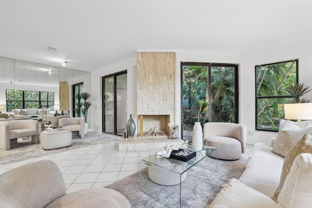 tiled living room featuring a fireplace