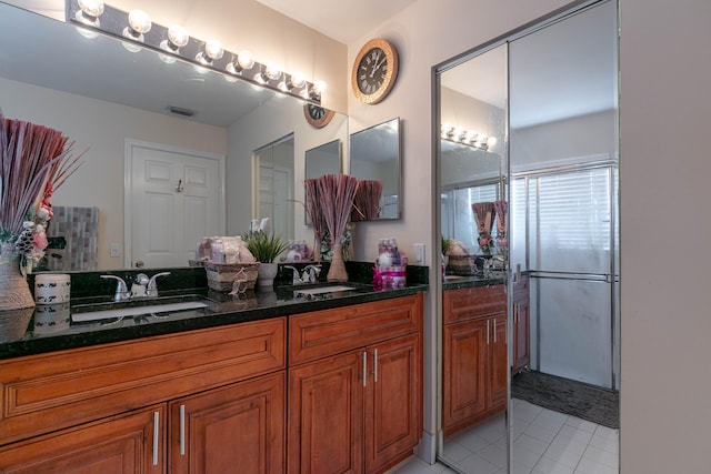 bathroom featuring vanity and tile patterned floors