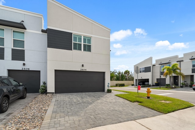 view of front of property with a garage