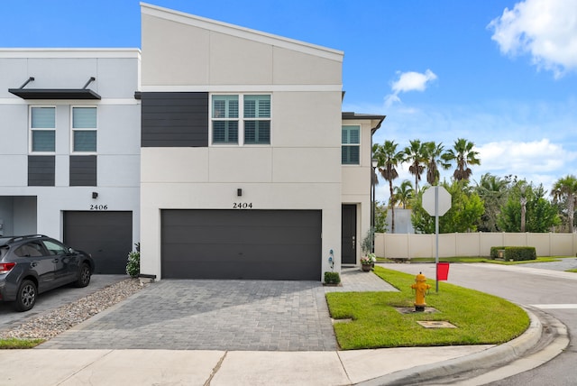 view of front of home with a garage