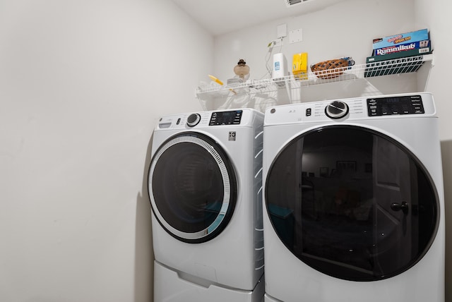 laundry area featuring washer and dryer