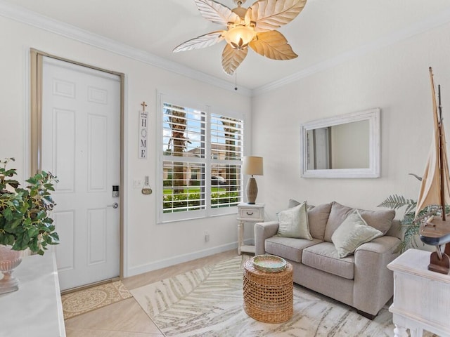 tiled living room with ornamental molding and ceiling fan