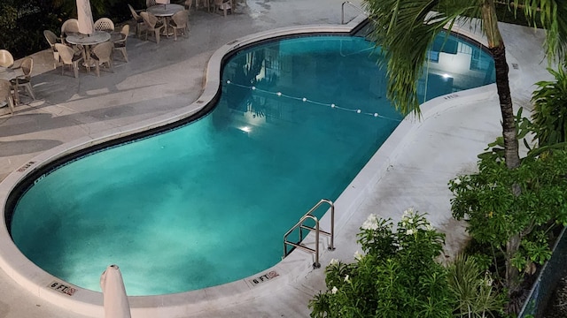 2145 Pierce St Unit 326, Hollywood, FL 33020 - community pool with a patio and outdoor dining area