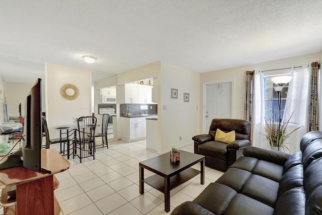 2145 Pierce St Unit 326, Hollywood, FL 33020 - living room featuring light tile patterned floors and a textured ceiling