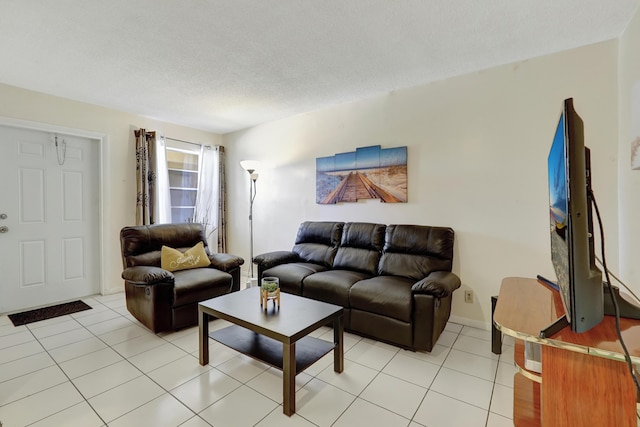 2145 Pierce St Unit 326, Hollywood, FL 33020 - living room with light tile patterned floors and a textured ceiling