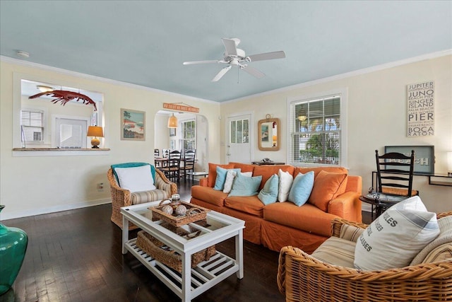 502 39th St, West Palm Beach, FL 33407 - living area featuring crown molding, arched walkways, hardwood / wood-style flooring, ceiling fan, and baseboards
