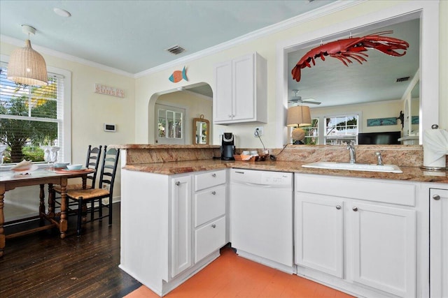 kitchen featuring kitchen peninsula, white cabinets, white dishwasher, dark hardwood / wood-style floors, and crown molding