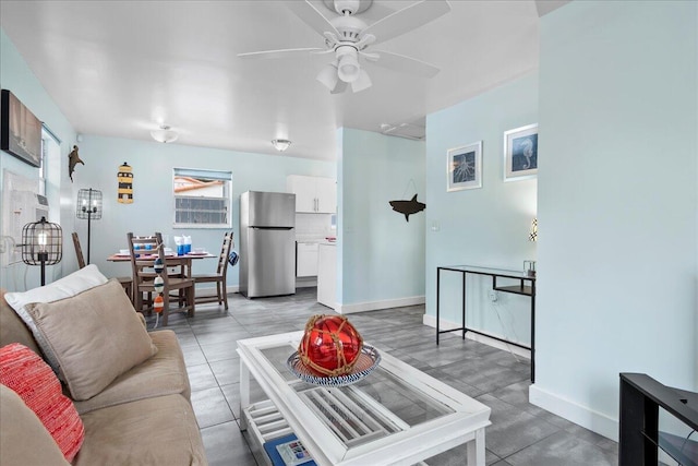 502 39th St, West Palm Beach, FL 33407 - living area featuring ceiling fan, baseboards, and light tile patterned flooring